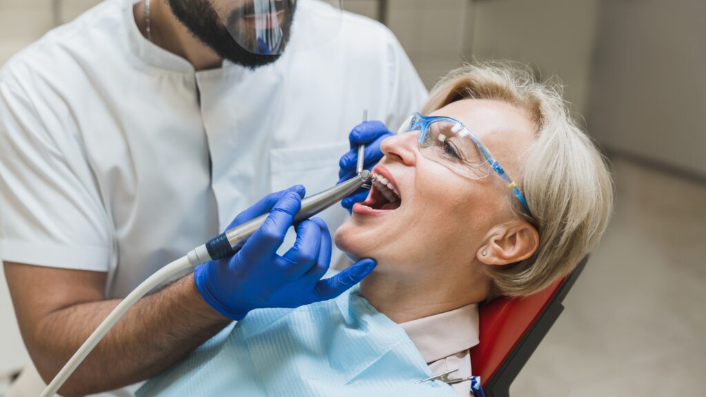 Patient receiving root canal therapy at a dental clinic in Columbia.